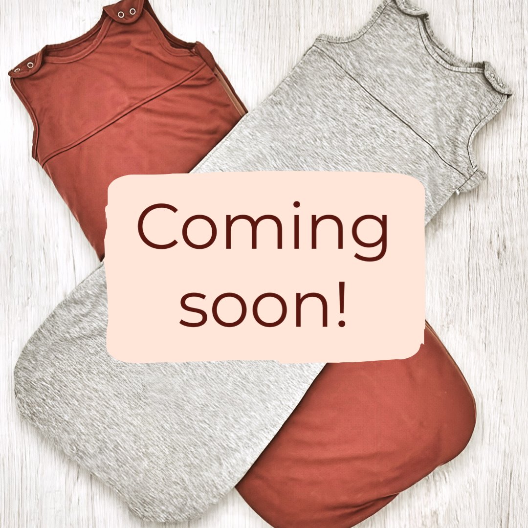 Wearable blankets and adjustable swaddles